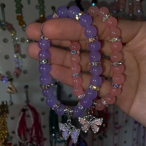 Purple and Pink Beaded Bracelets with Butterfly Charms